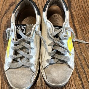 Kids Golden Goose shoes.